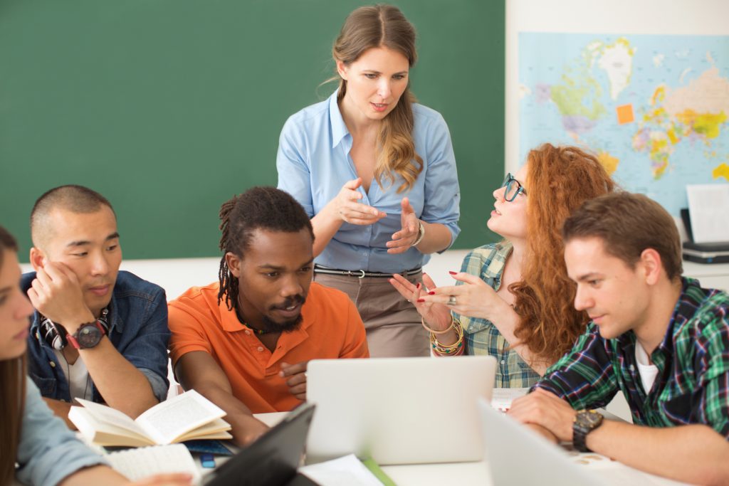 Group of college students in a classroom.